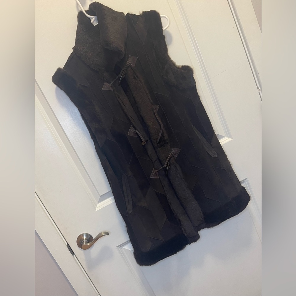 Damselle Suede patchwork rabbit trimmed vest with Toggle Horned buttons.